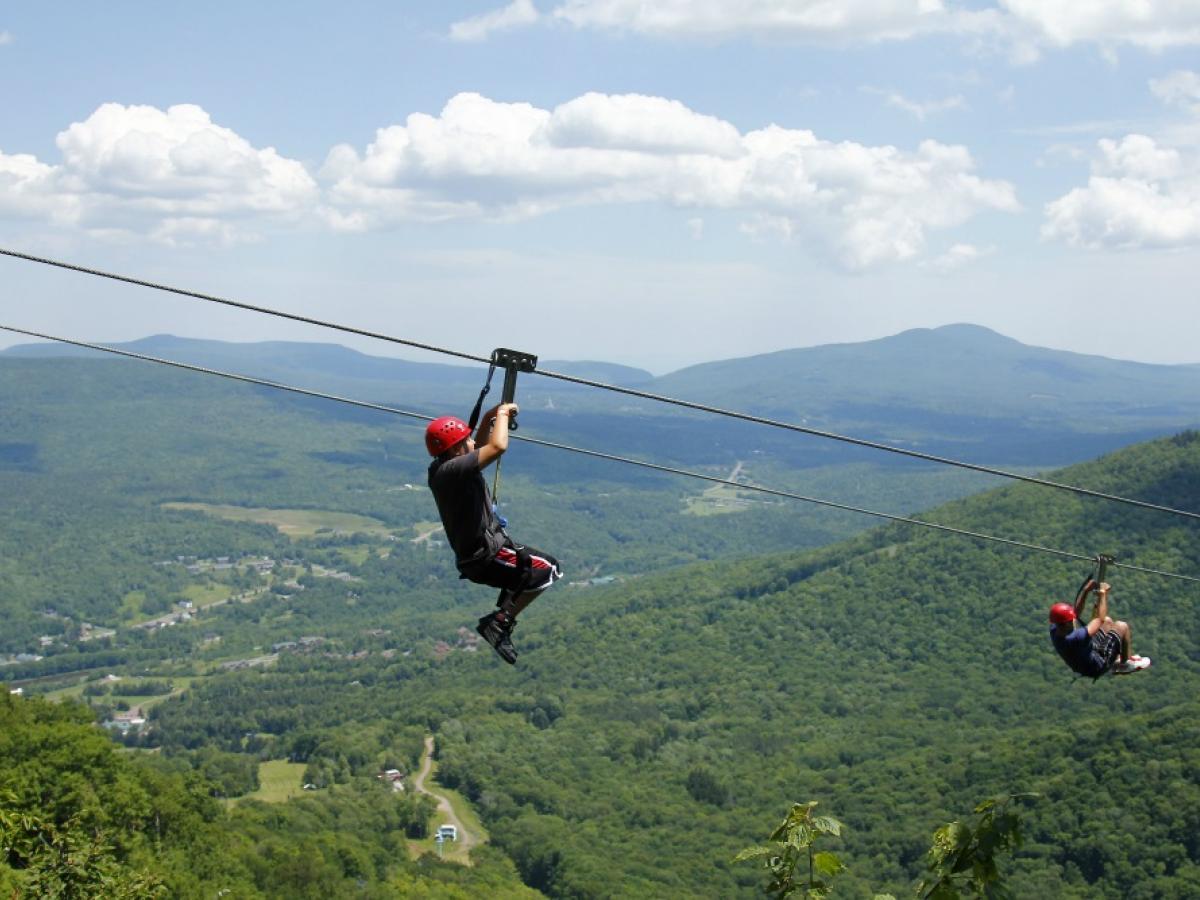 Zip-lining canopy walk Uganda forest